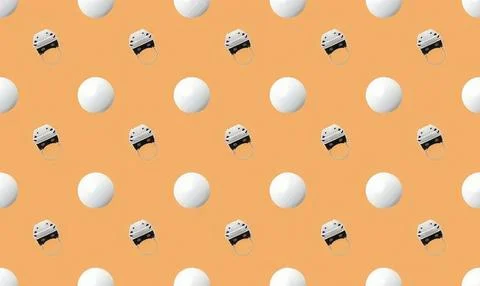 Pattern of white balls and black-and-white helmets on orange background Stock Illustration