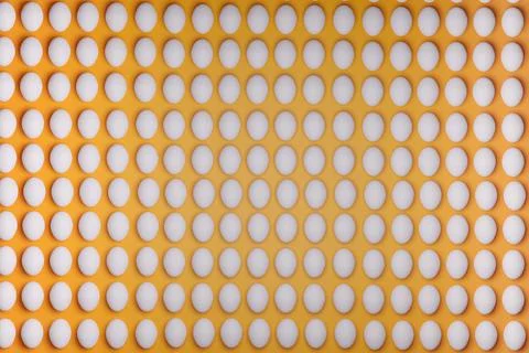 Pattern from white chicken eggs on yellow background top view. Creative food Stock Photos