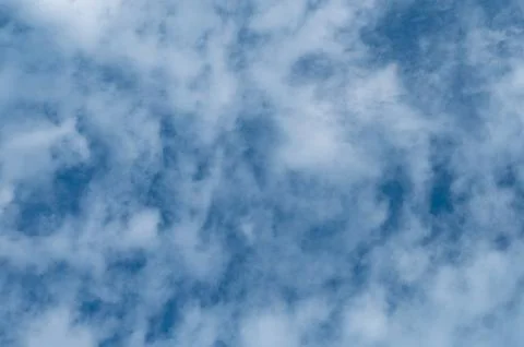 Pattern of white clouds on blue sky background Stockfoto's