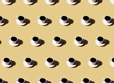 Pattern of white cup and saucer plate of black espresso coffee top view with Foto stock