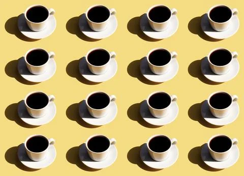 Pattern of white cup and saucer plate of black espresso coffee top view with Foto stock