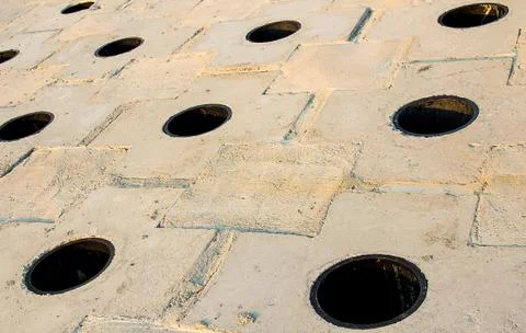 Pattern white gray with round black holes, perspective background industrial Foto stock