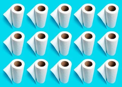 Pattern of white paper towels on blue background. Stock Photos
