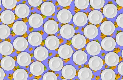 Pattern, white plates on a light blue background with autumn yellow maple lea Stock Photos