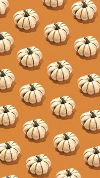 Pattern of white pumpkins on orange background vertical banner Stock-Fotos