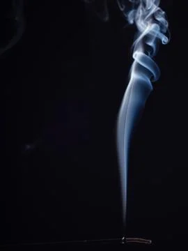 Pattern of white smoke isolated on black background, close up view. Abstract 스톡 사진