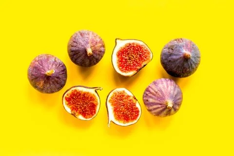 Pattern of whole and sliced figs. Overhead view Stock Photos