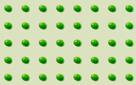 A pattern with a whole lime green on a light background. Citrus background. Stock Photos