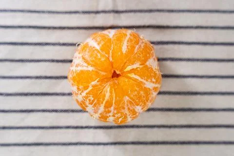 Pattern of whole tangerines or mandarin orange fruits and peeled segments iso Stock Photos