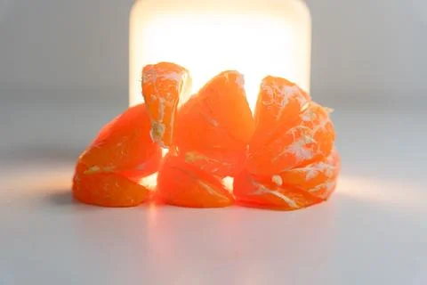 Pattern of whole tangerines or mandarin orange fruits and peeled segments iso Stock Photos