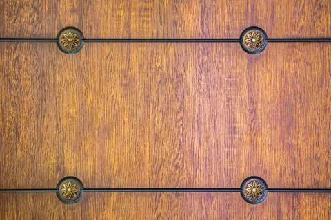 Pattern, wooden panel. Old texture of a wooden cabinet or chest of drawers. Stock Photos