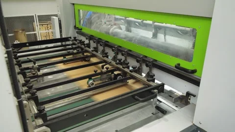 Pattern working corrugated cardboard production machine from the inside Video stock 280120153