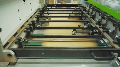 Pattern of working industrial machine cutting sheets of corrugated cardboard Video stock 280120129