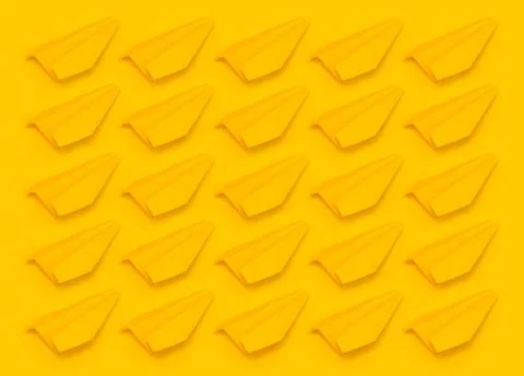 Pattern of yellow origami planes on a yellow background. Stock Photos