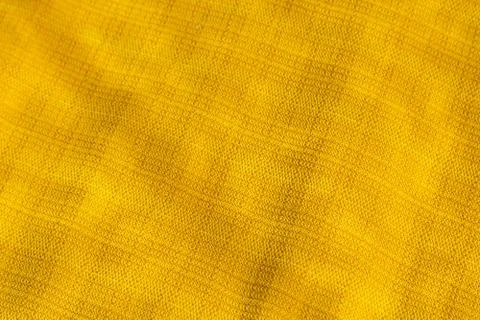 Pattern yellow textile sofa background. Stock Photos