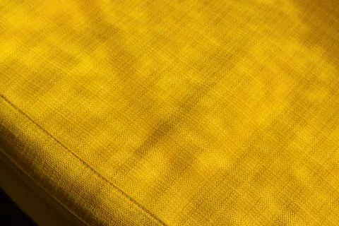 Pattern yellow textile sofa background. Stock Photos