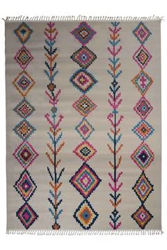 Patterned Afghan rugs on a white background Stock Photos