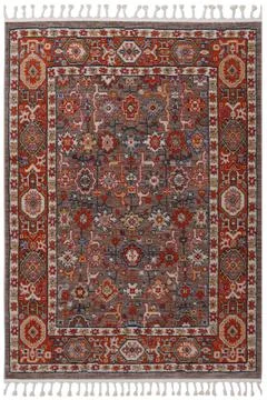 Patterned Afghan rugs on a white background Stock Photos