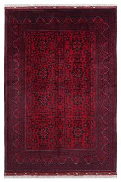 Patterned Afghan rugs on a white background Stock Photos