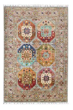 Patterned Afghan rugs on a white background Stock-Fotos