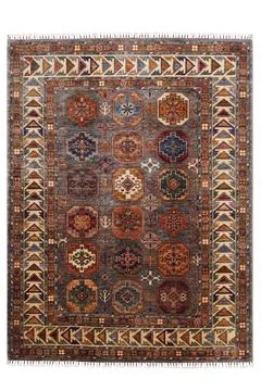 Patterned Afghan rugs on a white background Stock Photos