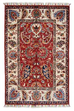 Patterned Afghan rugs on a white background Stock Photos