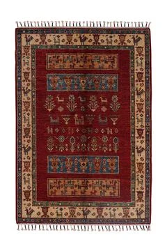 Patterned Afghan rugs on a white background Stock Photos