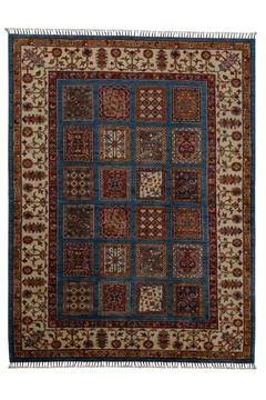 Patterned Afghan rugs on a white background Stock Photos