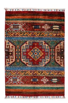 Patterned Afghan rugs on a white background Stock Photos