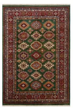 Patterned Afghan rugs on a white background Stock Photos