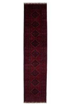 Patterned Afghan rugs on a white background Stock Photos