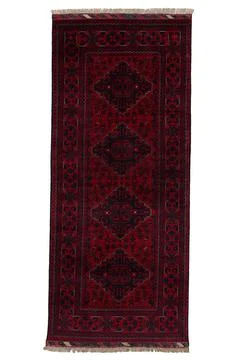 Patterned Afghan rugs on a white background Stock Photos