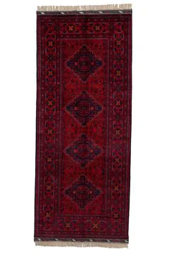Patterned Afghan rugs on a white background Stock Photos