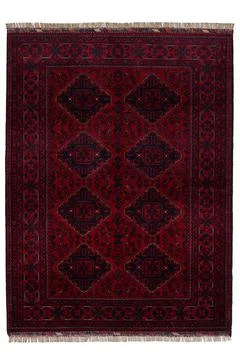Patterned Afghan rugs on a white background Stock Photos