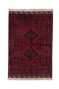 Patterned Afghan rugs on a white background Stock Photos