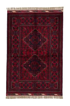 Patterned Afghan rugs on a white background Stock Photos
