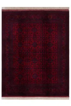 Patterned Afghan rugs on a white background Stock Photos
