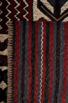 Patterned Afghan rugs on a white background Stock Photos