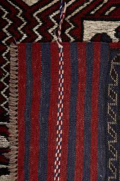 Patterned Afghan rugs on a white background Stock-Fotos