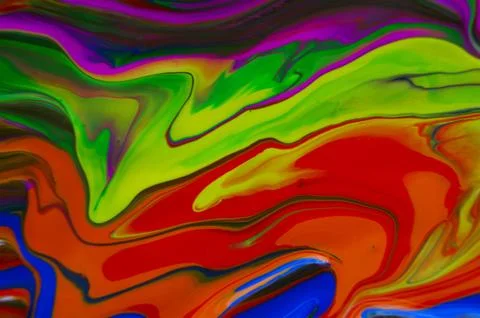 Patterned background of various flowing colors. Unique abstract background. Stock Photos