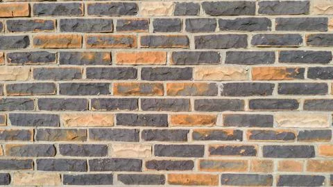 Patterned Brick Wall with Mixed Colors Foto stock
