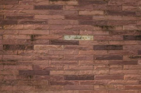 Patterned brick wall Fotos de archivo