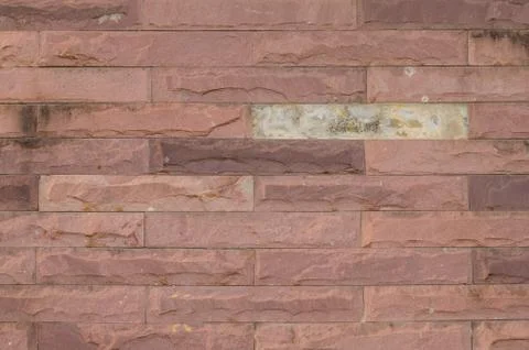 Patterned brick wall Fotos de archivo