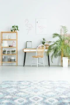 Patterned carpet in bright workspace Stock-Fotos
