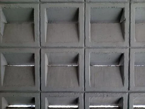 Patterned concrete wall with rectangular hollow details Stock Photos