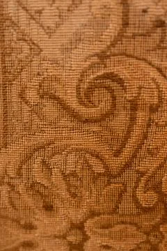 Patterned cotton rustic fabric in antique designs .Textured background. Stock Photos