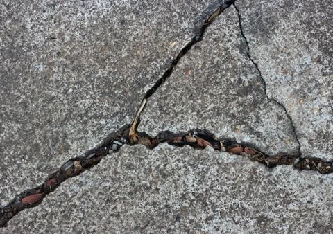 Patterned crack concrete. Stock Photos