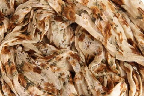 Patterned crumpled fabric texture background. Stock Photos