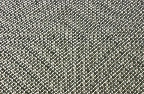 A patterned decorative wall on the outside of a building Stock Photos