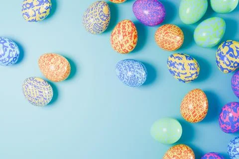 Patterned Easter eggs border on blue background. Illustrazione stock
